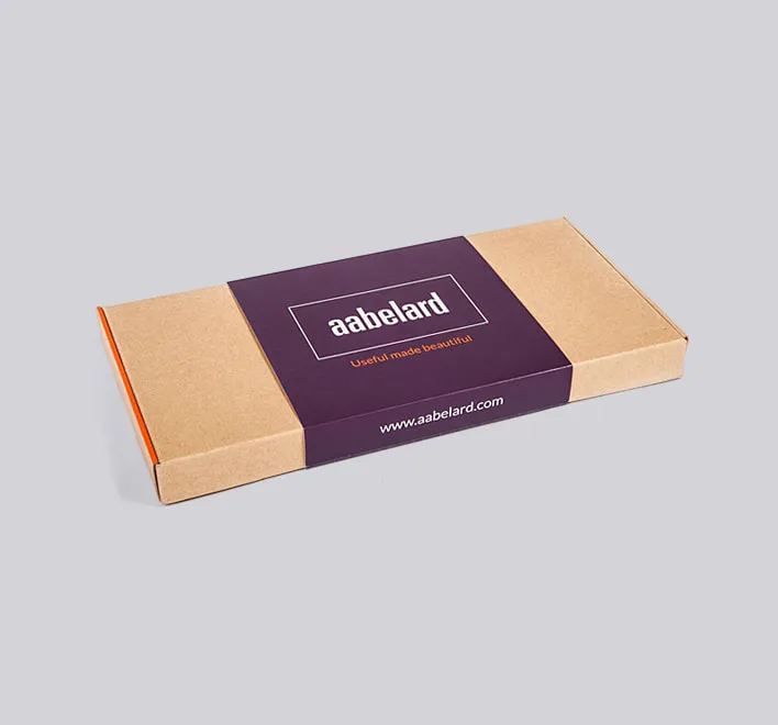 Aabelard corrugated card box with printed paper sleeve.