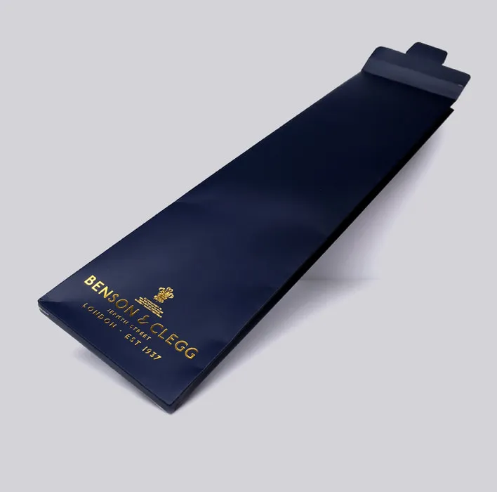 Paper tie sleeve with gold foil logo.