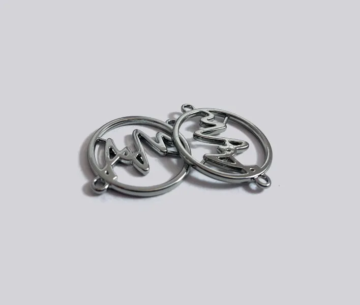 Cut-out metal sew-on decals.