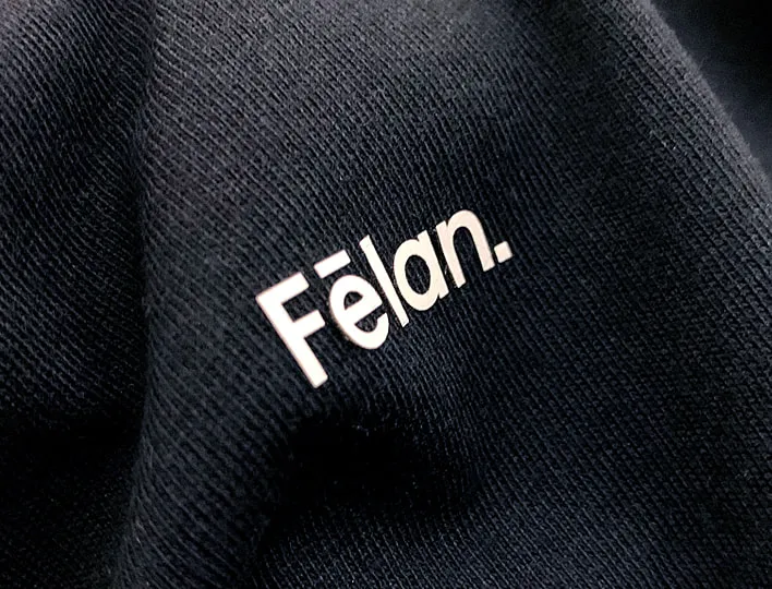 Raised heat press label for clothing.