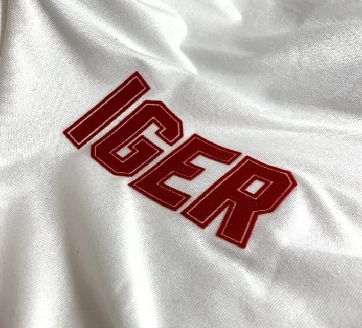 Iger flock heat transfer label.