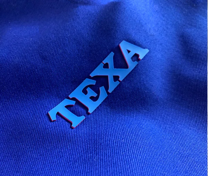 Texa raised profile heat press clothing label.
