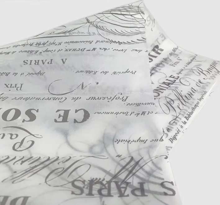 Printed custom tissue paper sheets.